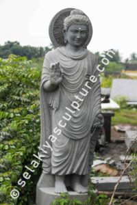 Buddha statue selakiya sculpture in mahabalipuram