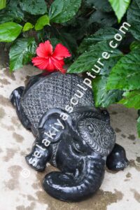 A beautiful elephant sculpture that would be a stunning addition to any garden.