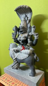 Ferocious half-man, half-lion statue of Lord Narasimha, a powerful Hindu deity known for protection and fearlessness.